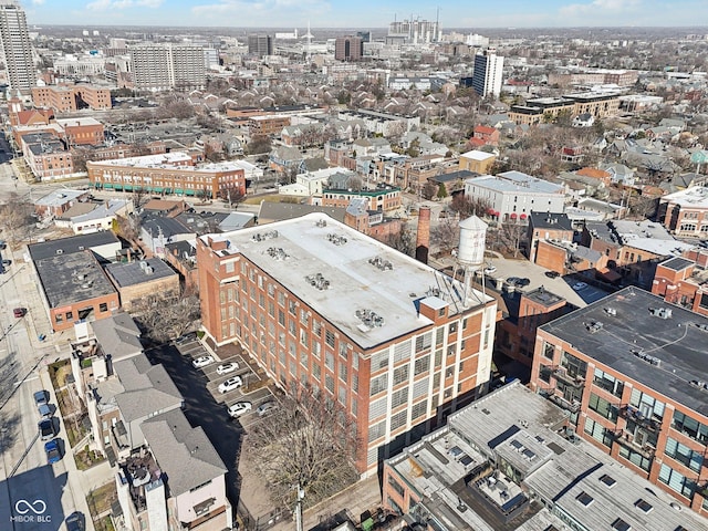 birds eye view of property with a view of city