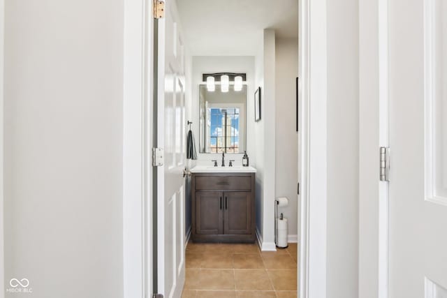 bathroom featuring vanity and tile patterned flooring