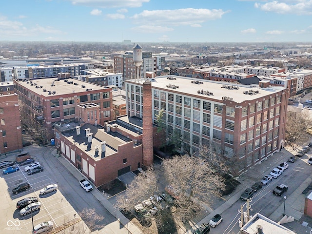 birds eye view of property with a city view