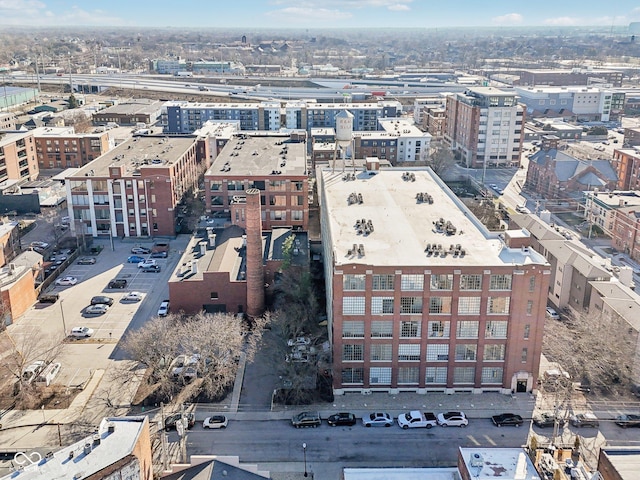 birds eye view of property with a view of city