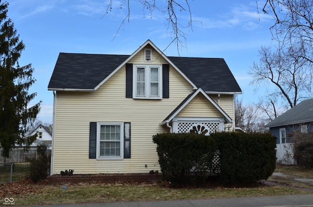 view of property exterior with fence