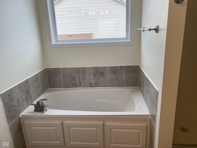 full bath featuring a jetted tub