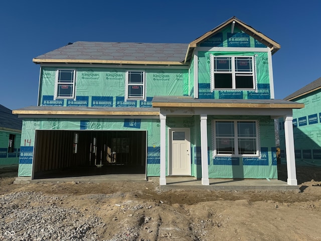 property under construction with an attached garage