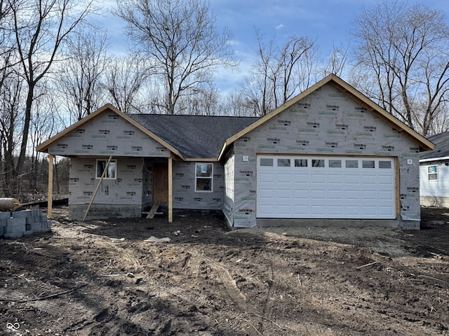 property in mid-construction featuring covered porch, driveway, and an attached garage