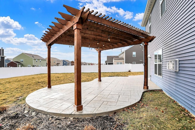 view of patio with fence, a residential view, and a pergola