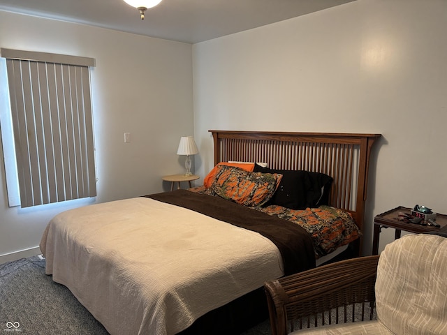 bedroom featuring carpet