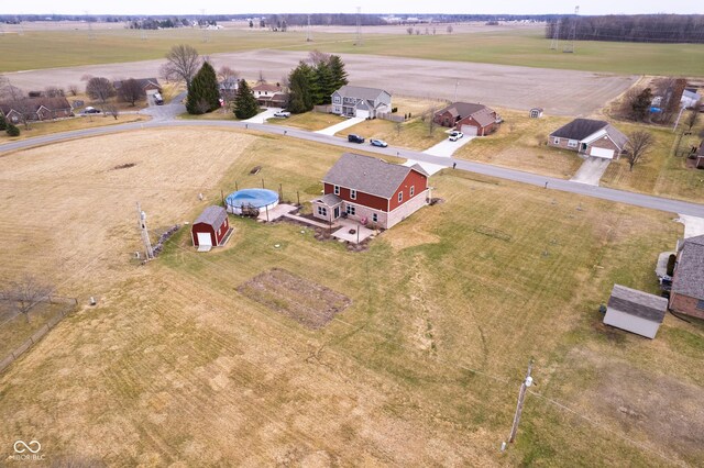 birds eye view of property featuring a rural view