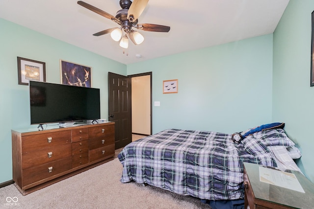 bedroom featuring carpet floors and ceiling fan