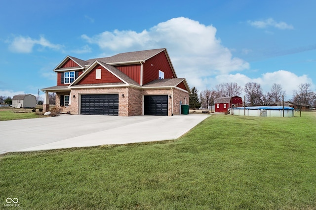 exterior space featuring brick siding, a shingled roof, concrete driveway, a lawn, and an outdoor pool