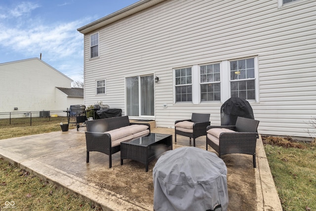 view of patio / terrace with central AC unit, a grill, fence, and an outdoor living space