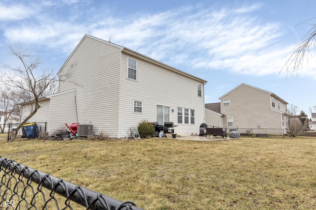 rear view of house with a patio, fence, a lawn, and central air condition unit