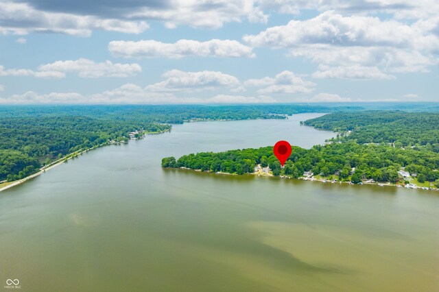 7600 N Blue Heron Dr, Unionville, IN 47468 - aerial view of a heavily wooded area and a nearby body of water