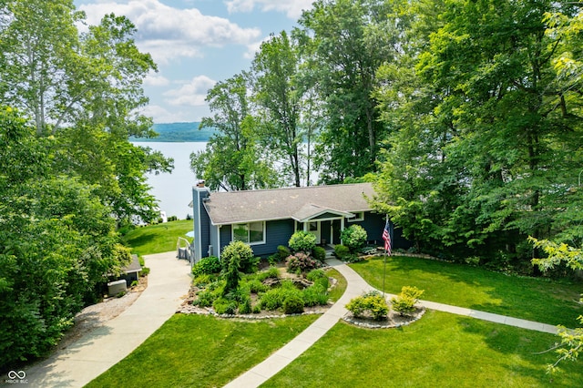 7600 N Blue Heron Dr, Unionville, IN 47468 - view of front of home featuring a water view, a chimney, and a front yard