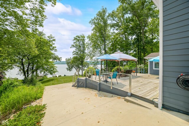 7600 N Blue Heron Dr, Unionville, IN 47468 - view of patio / terrace with a deck with water view