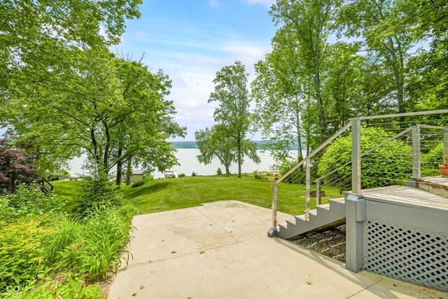 7600 N Blue Heron Dr, Unionville, IN 47468 - view of patio featuring a water view and stairway