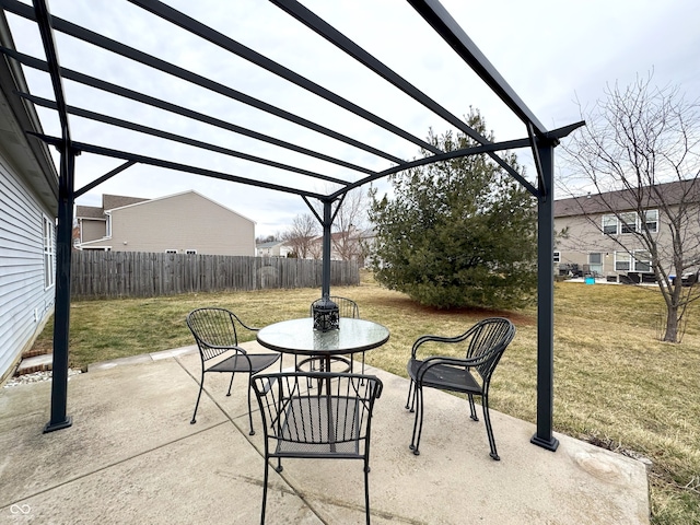 view of patio featuring fence and a pergola