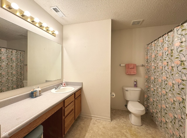 full bath featuring toilet, visible vents, a textured ceiling, and vanity