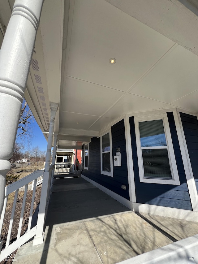 view of patio / terrace featuring a carport