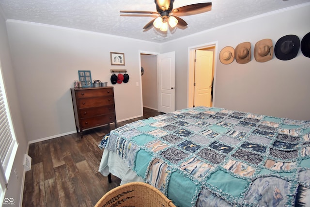 bedroom featuring baseboards, ceiling fan, ornamental molding, wood finished floors, and a textured ceiling