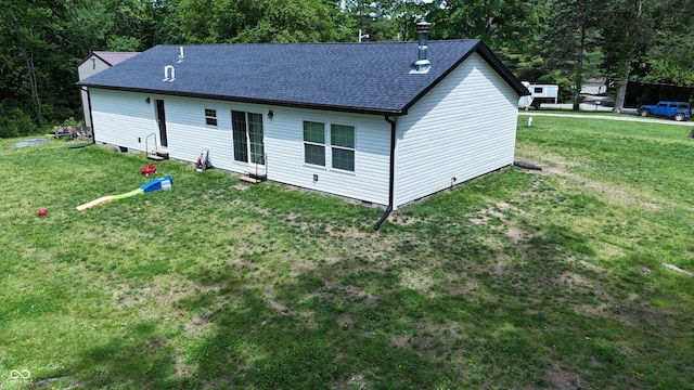 9191 W Mt Carmel Rd, Gosport, IN 47433 - back of house featuring a yard and a shingled roof