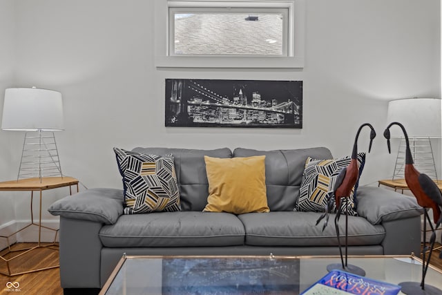 living room with wood finished floors and baseboards