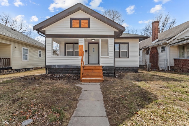 bungalow-style home featuring covered porch