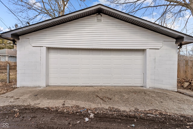 detached garage with fence