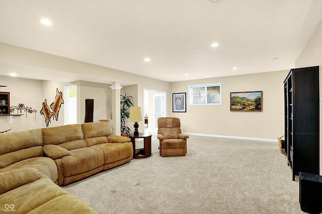 living room featuring recessed lighting, baseboards, and carpet