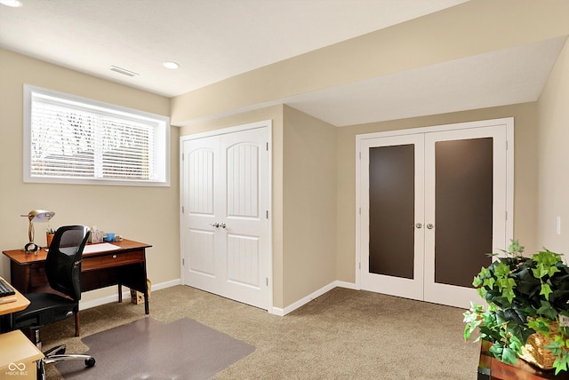 office space featuring visible vents, baseboards, carpet floors, recessed lighting, and french doors