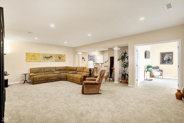 carpeted living room featuring recessed lighting, visible vents, and baseboards