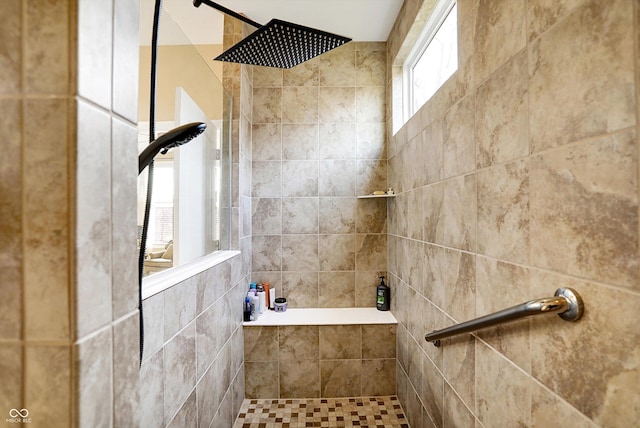 bathroom featuring tiled shower