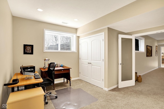 carpeted office space with recessed lighting and baseboards