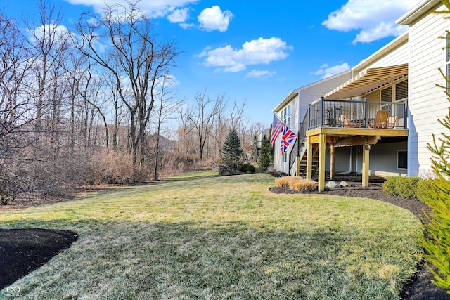 view of yard with stairway and a wooden deck