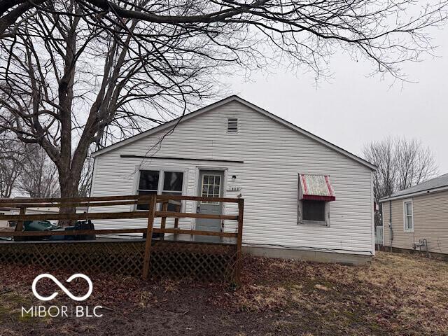 rear view of property with a deck