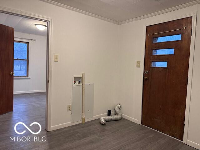 clothes washing area featuring hookup for a washing machine, laundry area, wood finished floors, baseboards, and crown molding