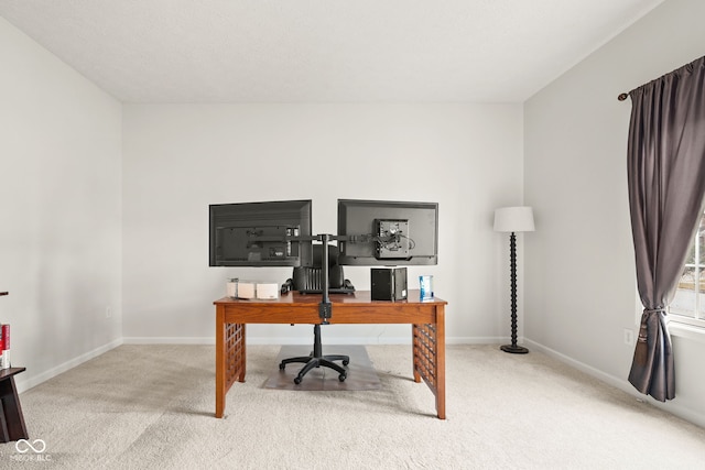 home office featuring carpet floors and baseboards