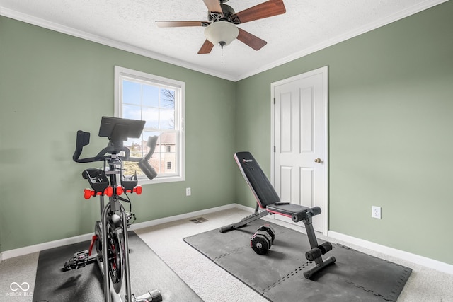 workout area with carpet, visible vents, a textured ceiling, and baseboards