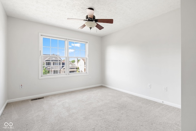 11866 Weathered Edge Dr, Fishers, IN 46037 - carpeted empty room with a textured ceiling, baseboards, and a ceiling fan