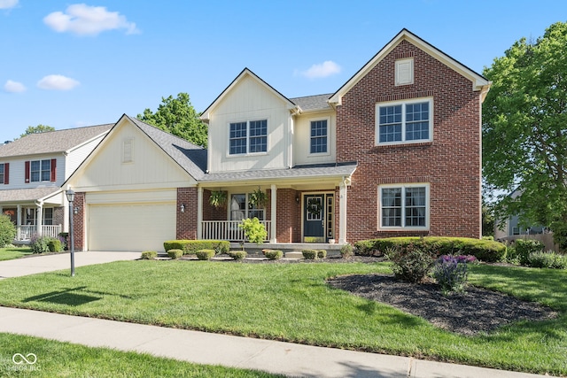 11866 Weathered Edge Dr, Fishers, IN 46037 - traditional-style home with a porch, brick siding, an attached garage, a front lawn, and concrete driveway