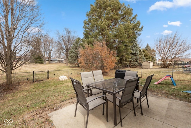 view of patio / terrace with outdoor dining space and fence