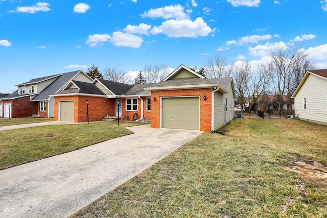 ranch-style home featuring a garage, a front yard, concrete driveway, and brick siding