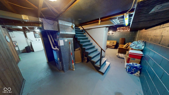 unfinished basement with stairs