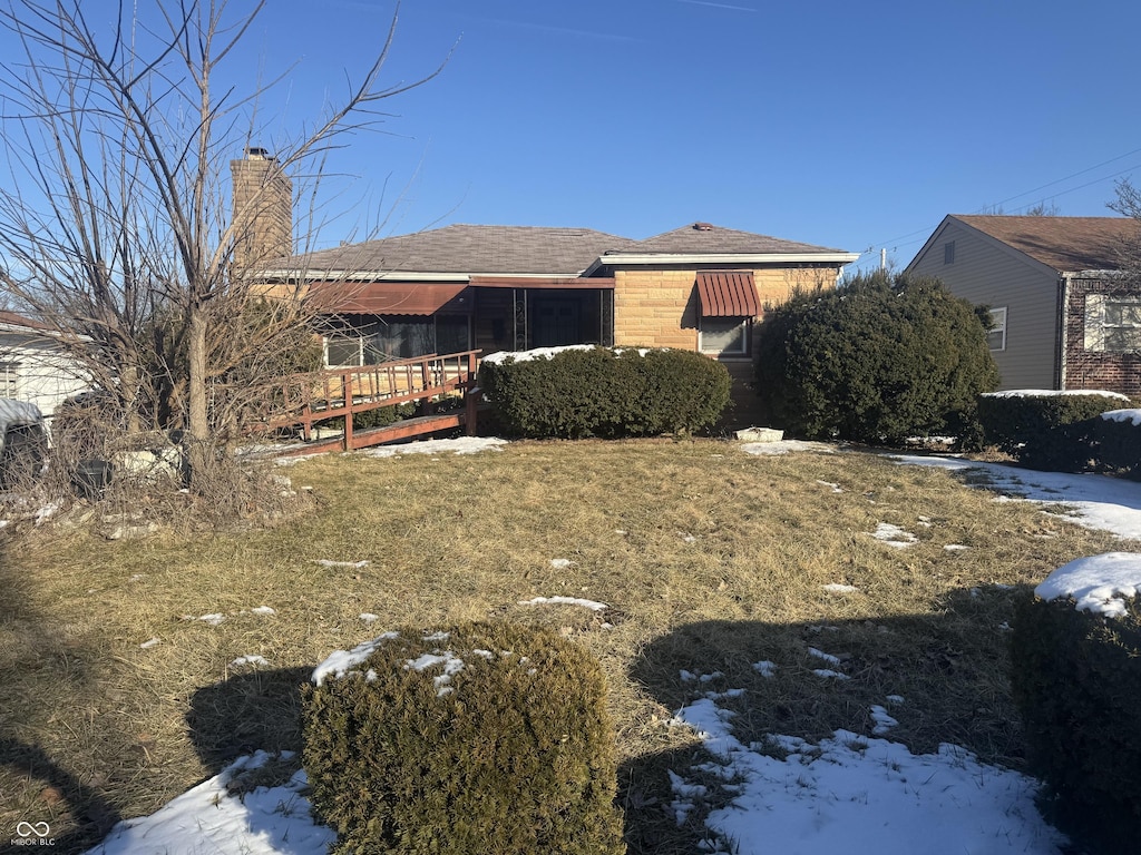 view of front of property with a chimney