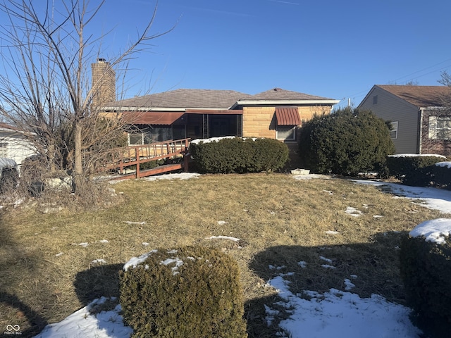 view of front of property with a chimney