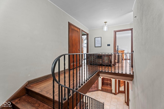 stairs featuring ornamental molding