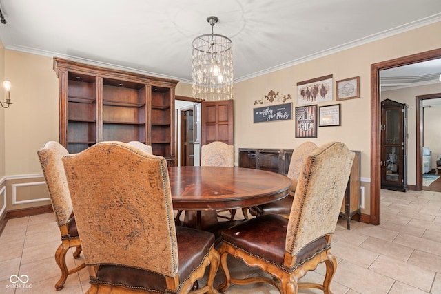 dining room featuring baseboards, an inviting chandelier, light tile patterned flooring, and crown molding