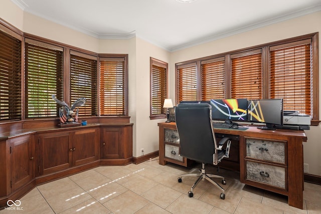 office space with light tile patterned floors, baseboards, and crown molding