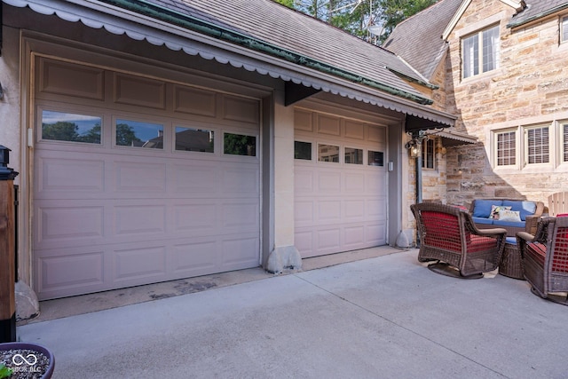 garage featuring driveway