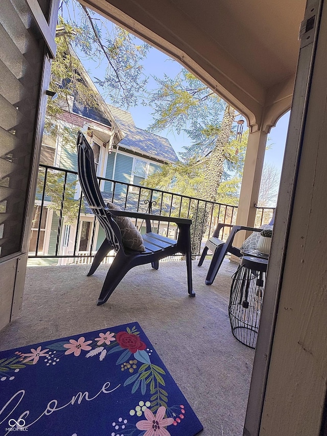 view of patio / terrace with a balcony