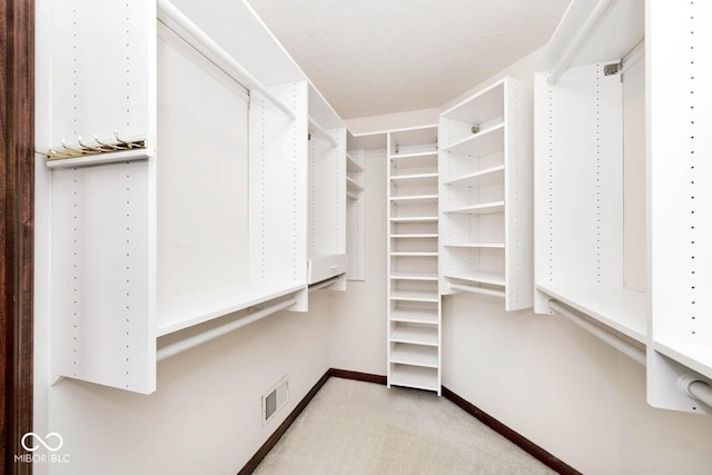 walk in closet featuring visible vents